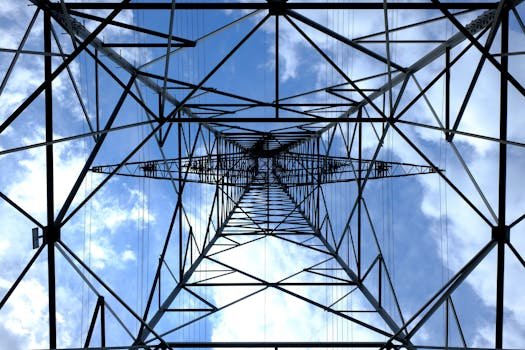 Low Angle Photograph of Black Metal Tower Satellite during Daytime